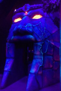 Door in a laser tag arena that looks like a face