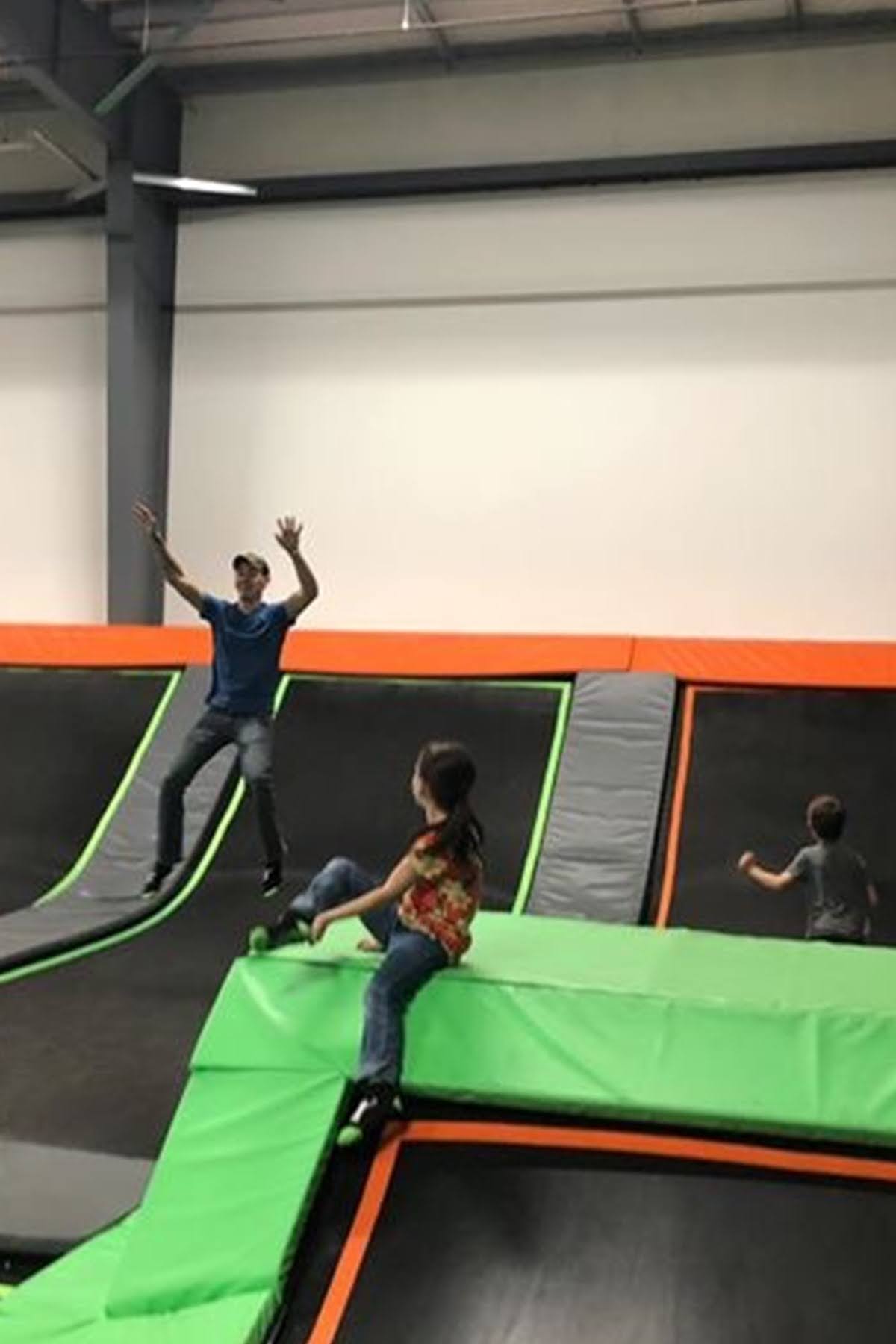 Kids jumping on trampolines