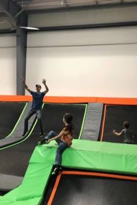 People jumping on trampolines